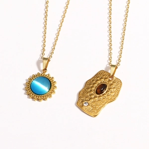Retro titanium steel 14K gold plated necklace with blue opal and textured metal pendants