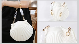 Detailed views of a white shell evening bag with acrylic pearl chain and pearl accent
