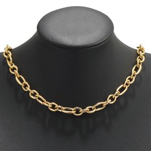 Close-up of golden vacuum plated 16mm oval cross link chain necklace on black mannequin