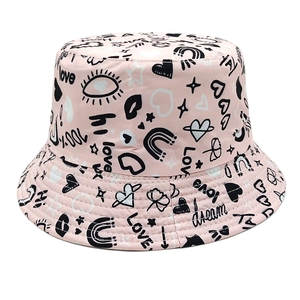 Pink reversible bucket hat with heart graffiti prints for casual Valentine fashion