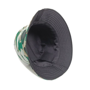Detail of reversible camouflage bucket hat featuring neat stitching and black inner lining