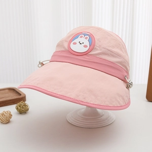 Detail of pink kids sun visor featuring cartoon rabbit embroidery and adjustable buckles