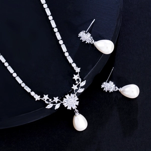 Minimalist pearl jewelry set with zircon necklace and drop earrings in silver finish