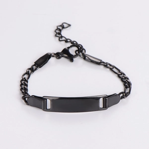 Macro view of adjustable black stainless steel chain bracelet with a polished engravable bar