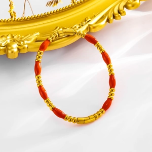 Minimalist red drip oil beads stainless steel bracelet with vintage gold frame background