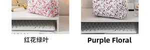 Detail of floral quilted makeup bags in red flower and purple lavender patterns