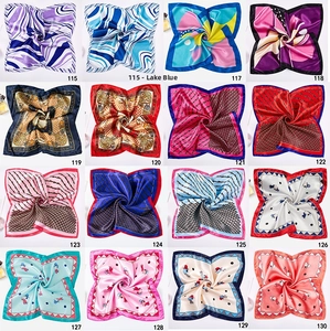 Selection of 16 square satin scarves with leopard, geometric, and chain prints