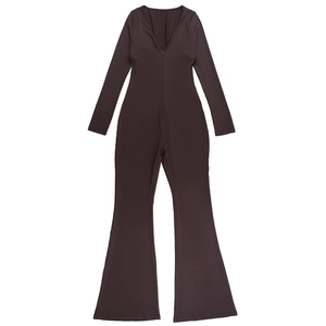 Detail view of deep brown long sleeve jumpsuit featuring zip neckline and flared leggings