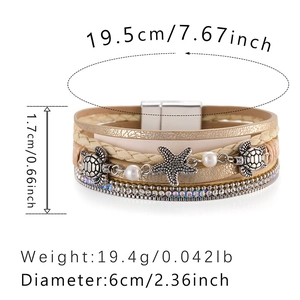 Detailed view of multilayer leather ocean bracelet with sea turtle and starfish charms