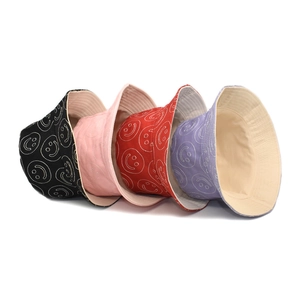 Stylish embroidered smiley face bucket hats in multiple colors for women sun protection