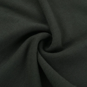 Vue macro détaillée montrant la texture en tricot doux et le tissu élastique du haut
