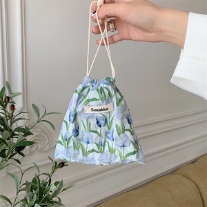 Detail of floral drawstring pouch with tulip print and woven Sozakka label detail