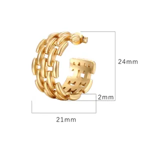 Macro view of 24mm gold geometric C-shaped earrings with a linked bracelet design
