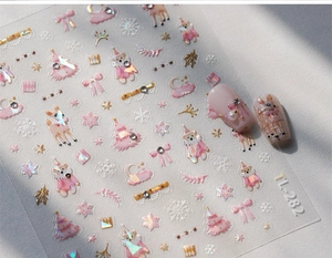 Detail of TL-282 Christmas nail stickers featuring pink bears and gold foil accents