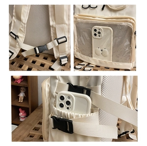 Detail view of adjustable buckles, transparent mesh pocket and side elastic pouch