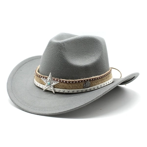 Close-up of grey felt cowboy hat with star rivet band and turquoise bead detail
