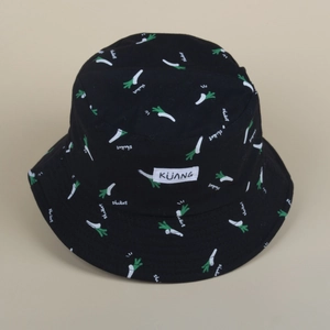 Reversible bucket hat with cartoon shallot print and KUANG woven label in black canvas