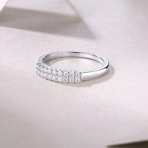 Detailed macro view of S925 sterling silver ring featuring double row of inlaid moissanite
