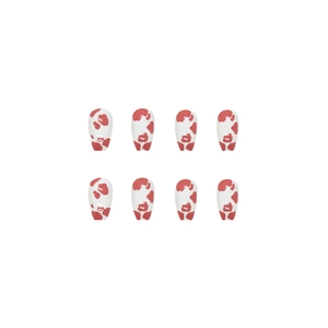 Short ballet press-on nails with red cow pattern and white base on a clean background