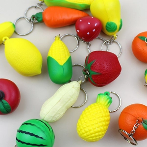 Detailed assortment of creative mini fruit and vegetable PU foam keychains with metal chains