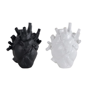 Artistic anatomical heart vases in matte black and glossy white for modern home decor