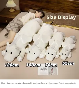 Soft white plush unicorn pillow showing 55cm to 120cm sizes for sleeping and comfort