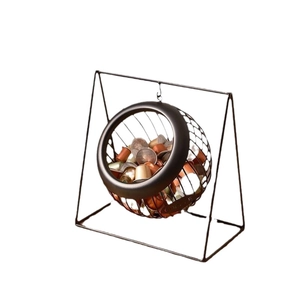 Spherical bronze iron wire coffee capsule holder with creative hanging storage design