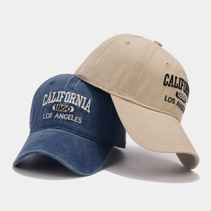 Vintage embroidered cotton baseball cap in navy blue and beige with California lettering