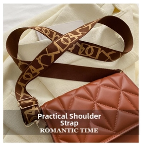 Close-up of brown quilted leather crossbody bag with wide woven jacquard strap details