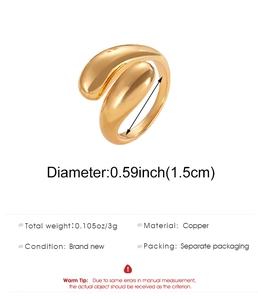 Detail view of gold teardrop copper ring showing 3g weight and 1.5cm diameter specs
