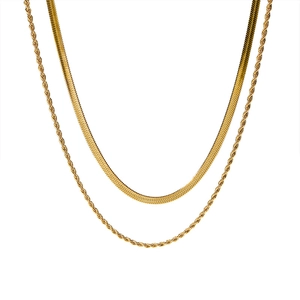 Detailed macro of 18k gold plated snake chain and twisted rope chain necklace set