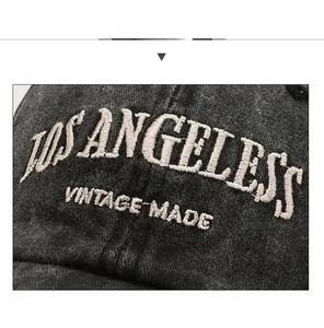 Close-up of vintage washed grey cotton baseball cap with Los Angeles embroidery