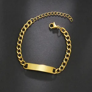 Detail shot of golden stainless steel Cuban link bracelet with engravable metal nameplate