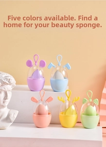 Close-up of portable makeup sponge set with cute animal ear cases in five pastel colors