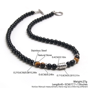 Tiger eye and obsidian beaded necklace with stainless steel OT clasp on white background