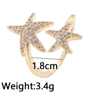 Hiphop style adjustable copper ring with double starfish design and zircon stones