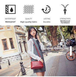 Close-up of red crocodile-pattern PU leather handbag with durable waterproof material