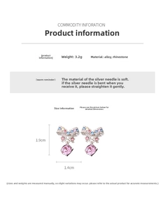 Macro shot of colorful bowknot earrings with pink gemstones showing 1.9cm height detail