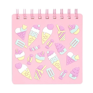Pink spiral notebook with 3D ice cream and macaroon dessert designs on cover