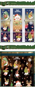 Detail view of festive Christmas window clings with gnomes and snowflakes on glass