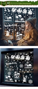 Detailed view of white Christmas window stickers with Santa, reindeer and snowflakes