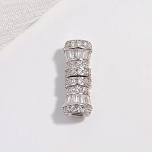 Close-up of S925 silver waist bead connector with pavé zircon settings for DIY necklaces
