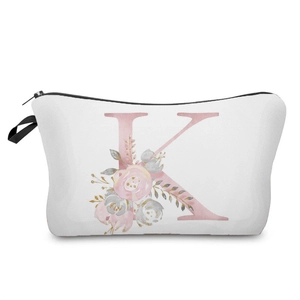 Close-up detail of white cosmetic bag featuring a pink floral alphabet K letter print