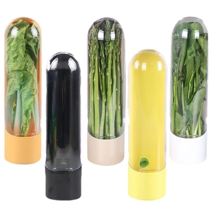 Capsule-shaped herb saver pods in five colors for keeping asparagus and herbs fresh