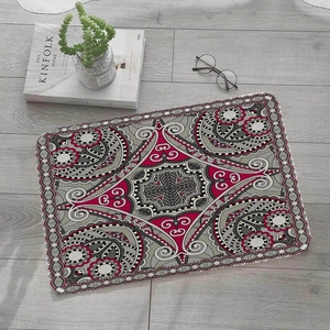 Close-up of bohemian mandala flannel floor mat on grey wood floor with home decor