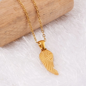 Golden 18K stainless steel wing pendant necklace with detailed feather texture