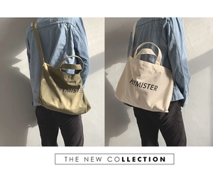 Detailed comparison of olive green and beige canvas tote bags with Heymister print