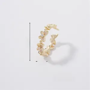 Macro shot of butterfly ring with white crystals measuring 2.3cm diameter and 2.9g weight