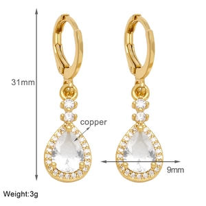 Detail view of gold teardrop earrings with white zircon, size 31mm by 9mm, weight 3g
