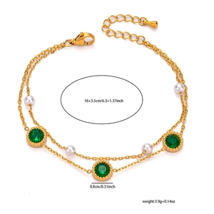 Detail of double-layer gold chain bracelet with green zircon, pearls, and sizing labels